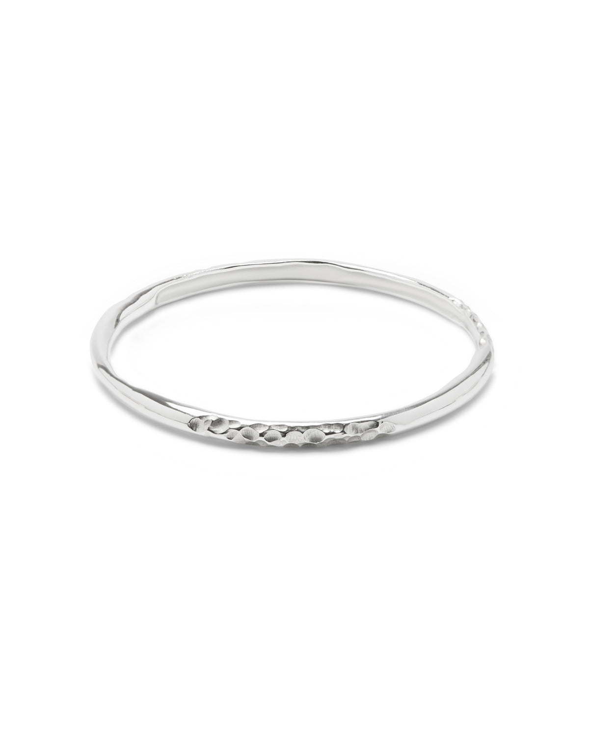 Sculptural, textured sterling silver bangle.