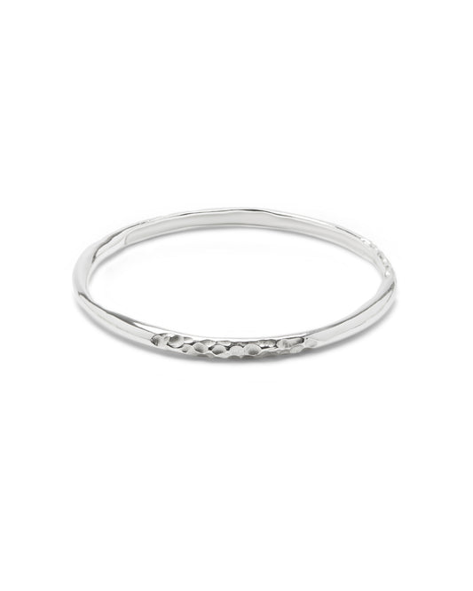 Sculptural, textured sterling silver bangle.