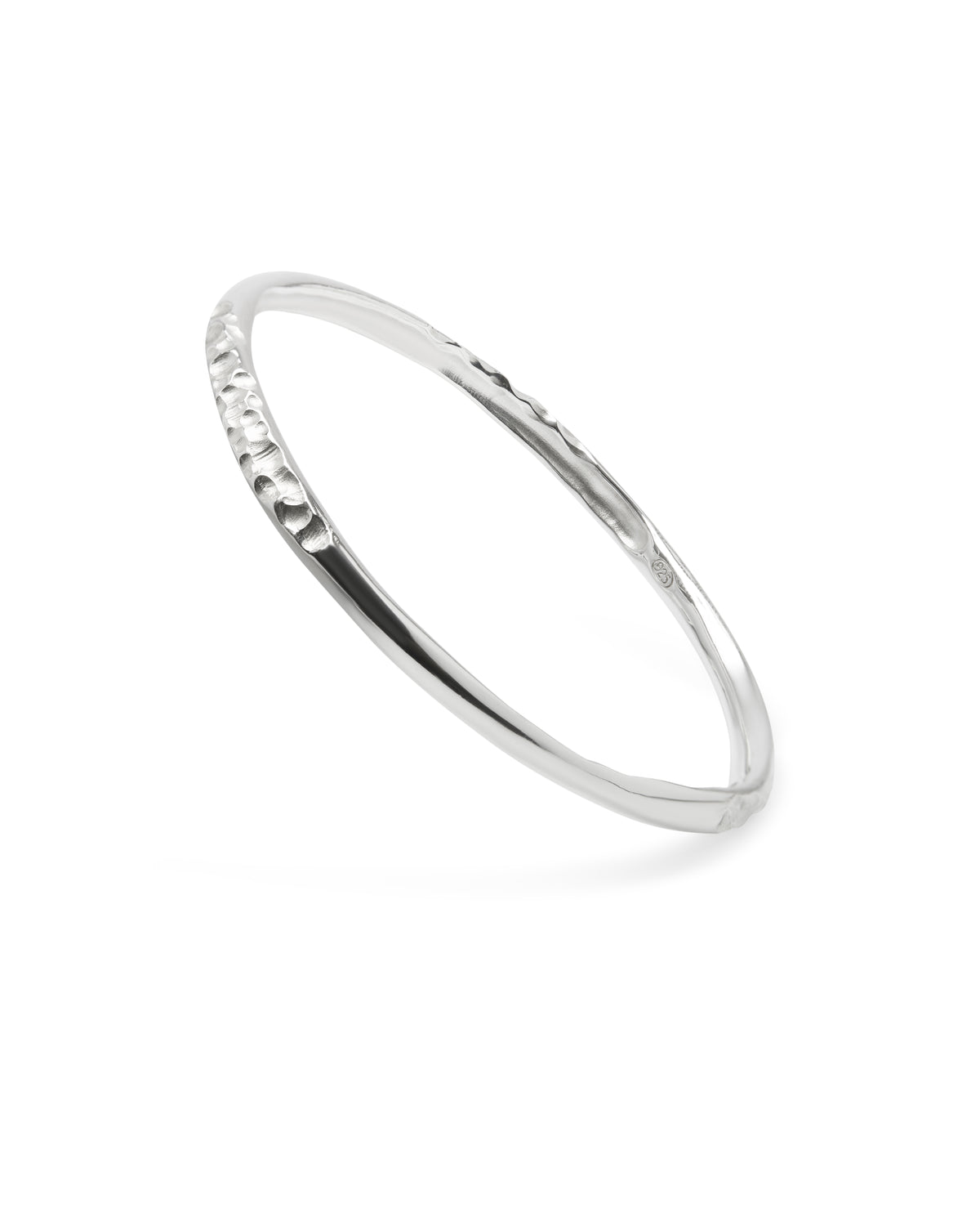 Sculptural, textured sterling silver bangle.
