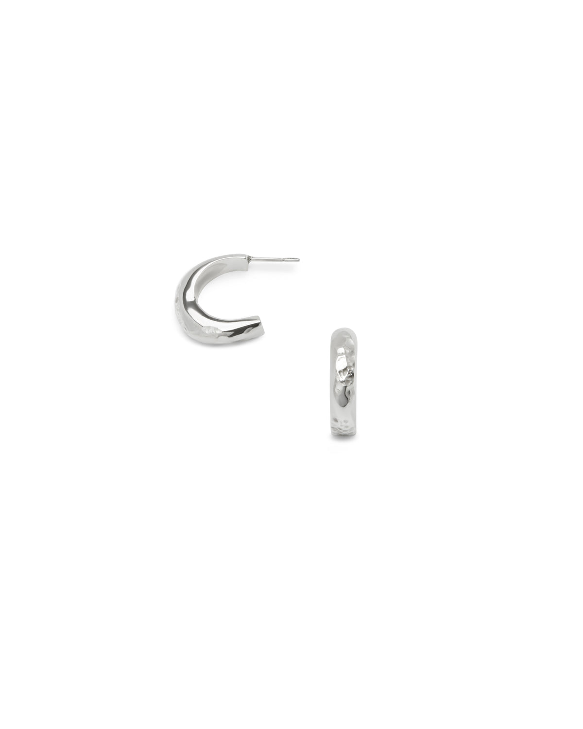 Sculptural textured sterling silver hoop earrings on a white background
